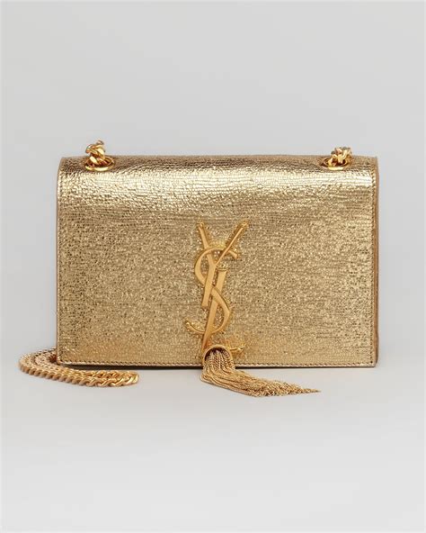 ysl clutch bag gold tassel|yves saint laurent clutch.